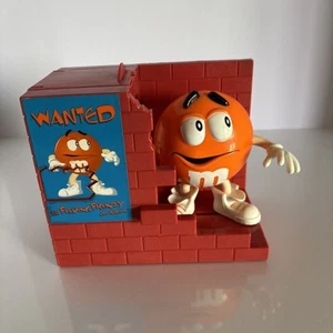 1999 Orange M&M Candy Dispenser, “Wanted The Feeding Frenzy Has Begun!” - Picture 1 of 8