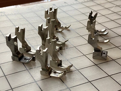 Industrial Sewing Machine Accessories Lot- high shank feet, needles, bobbin case - Image 1 of 2