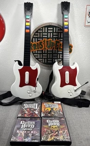 PS2 Guitar Hero Lote 2 Rojo Octano SG Blanco/Rojo con 4 Juegos - Imagen 1 de 13