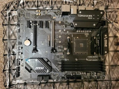 MSI B450 Tomahawk Max AMD Motherboard W/ Book And Driver DVD Not Tested - Image 1 of 4