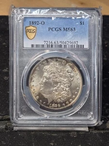 1892 O Morgan Silver Dollar PCGS MS-63 - Picture 1 of 2