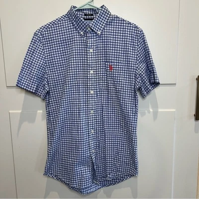 U.S. Polo Assn. Camisa abotonada manga corta a cuadros geométricos azul para hombre pequeña Foto 1 de 4