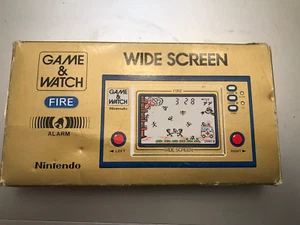 VINTAGE NINTENDO SPIEL UND UHR FIRE NEU IM BOX - Bild 1 von 3