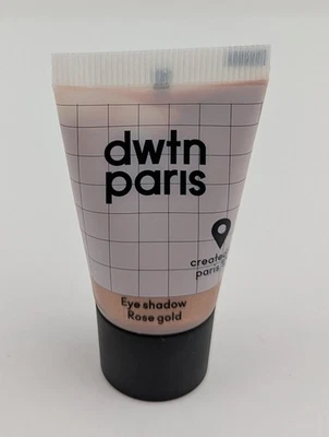 Sombra de ojos líquida dwtn Paris en oro rosa 10 ml/0,33 fl. oz. Tamaño de viaje Foto 1 de 2