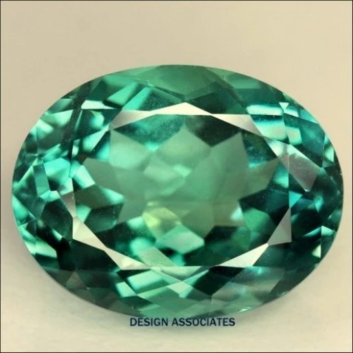 GREEN TOPAZ 7 x 5 MM OVAL CUT VVS BEAUTIFUL COLOR - Image 1 of 1