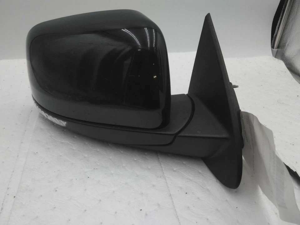 Espejo retrovisor derecho usado se adapta a: Dodge Durango 2012 pintado eléctrico sin memoria con giro Foto 1 de 4