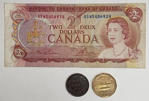 Lot: 1974 Canada $2 Two Dollar Bank Note, 1902 1-cent coin, 2004 1-dollar coin - Picture 1 of 8