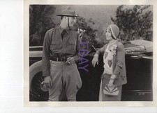 Dorothy Sebastian stands by a car smiles at a soldier VINTAGE Photo