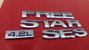 04 05 06 07 FORD FREESTAR SES 4.2L EMBLEM LOGO BADGE NAMEPLATE REAR OEM - Picture 1 of 5