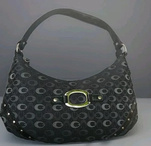 BELLISSIMA BORSA NERA CON BORCHIE ARGENTO E GRANDE FIBBIA ARGENTO - Foto 1 di 18