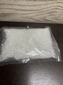 Cuentas de semillas de vidrio 4 mm planas forma redonda cuentas sueltas joyería hágalo usted mismo iridiscente transparente - Imagen 1 de 3