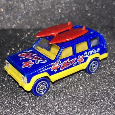 Majorette Jeep Cherokee Limited with surf boards No.224 /1:60 R677 - Image 1 of 4