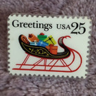 Broche timbre traîneau Greetings USA 25