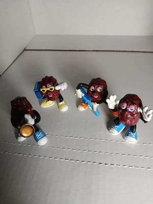 Lote de 4/3 figuras vintage de PVC California Raisins relacionadas con la música Foto 1 de 4