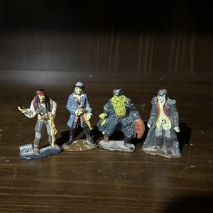 Lotto 4 action figure giocattoli Disney Zizzle Pirati dei Caraibi - Foto 1 di 9