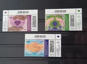 BRD 2024 "Helferinnen + Helfer der Menschheit Satz mit Eckrand + Rundstempel - Bild 1 von 1