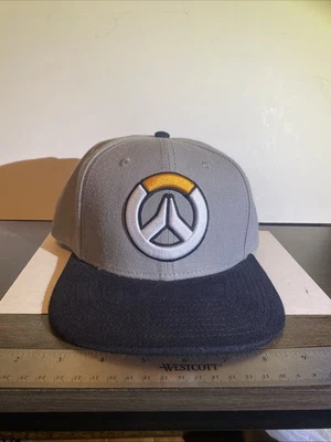 Gorra Overwatch Para Hombre Talla Única Gris Negra Snapback Gorra Blizzard Videojuegos JINX Foto 1 de 4
