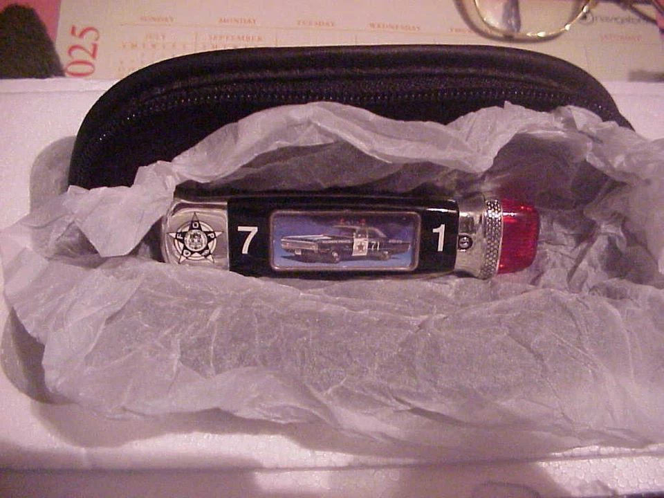 Cuchillo de coleccionista Police Franklin Mint 1971 Plymouth Fury hoja única con caja bolsa Foto 1 de 4