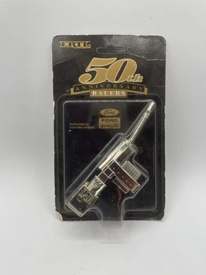 1/64th Scale Ford New Holland 50th Anniversary Baler Hayliner ERTL NEW SILVER - Image 1 of 2