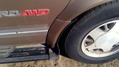 Chevy Astro 1995-2005 pasajero moldura derecha de guardabarros OEM moldura marrón Foto 1 de 4