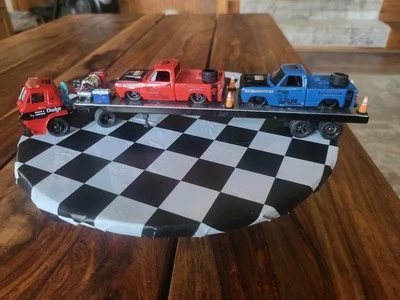 M2 Customized Auto Trucks  1:64 66 Dodge L600 Tow Truck & Two 76 SRT Pickups - Image 1 of 4