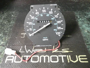 83-86 Nissan Pickup truck 720 dash cluster speedo speedometer gauge assembly 243 - Picture 1 of 6
