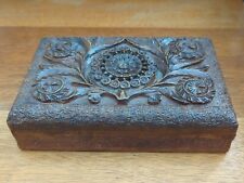 An Indian Wooden Box Carved in High Relief with a Floral Design 