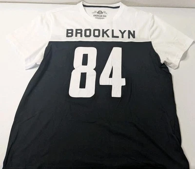 Camisa Jersey American Rag Para Hombre XXL Blanca Negra Brooklyn #84 Manga Corta Foto 1 de 4