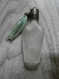 Vintage Perfume Bottle Green Tassel Metal Screw Lid Small Lay Down Bottle - Picture 1 of 3