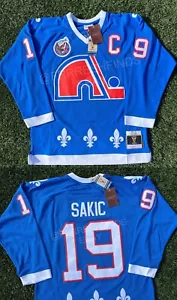 Mitchell & Ness Quebec Nordiques Joe Sakic 1992-93 Blue Line Player Jersey - Picture 1 of 21