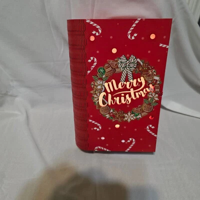 Battery Operated Lighted Hollowed Out Christmas Book - Image 1 of 4