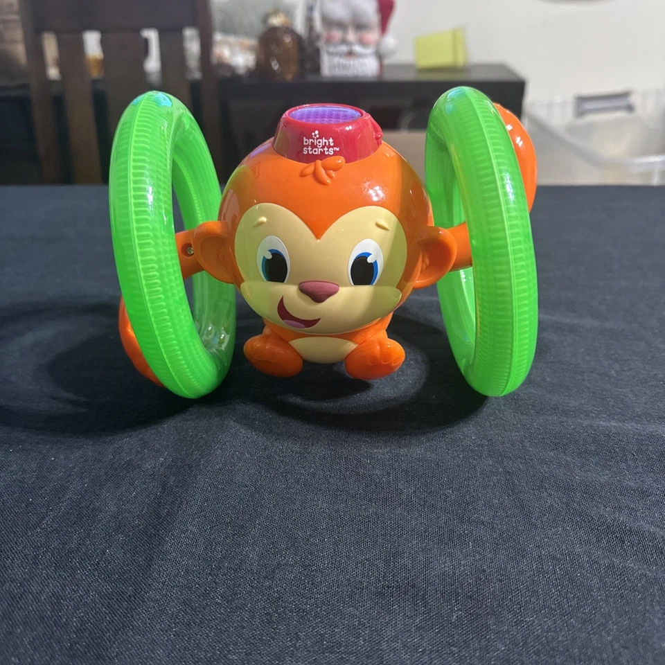 Juguete para bebé gateando mono con luces y sonidos Bright Starts Roll & Glow Foto 1 de 4