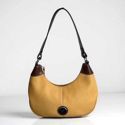 Auténtico bolso hobo de hombro de cuero marrón amarillo Dooney & Bourke Foto 1 de 4