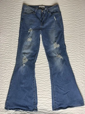 Pantalones de mezclilla para mujer casi famosos azules desgastados acampanados talla 11 buen estado Foto 1 de 4