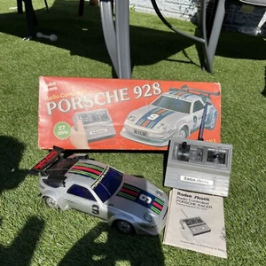 Radio Shack Porsche 928 auto radiocomandata 60 3017 ricambio o riparazioni - Foto 1 di 18