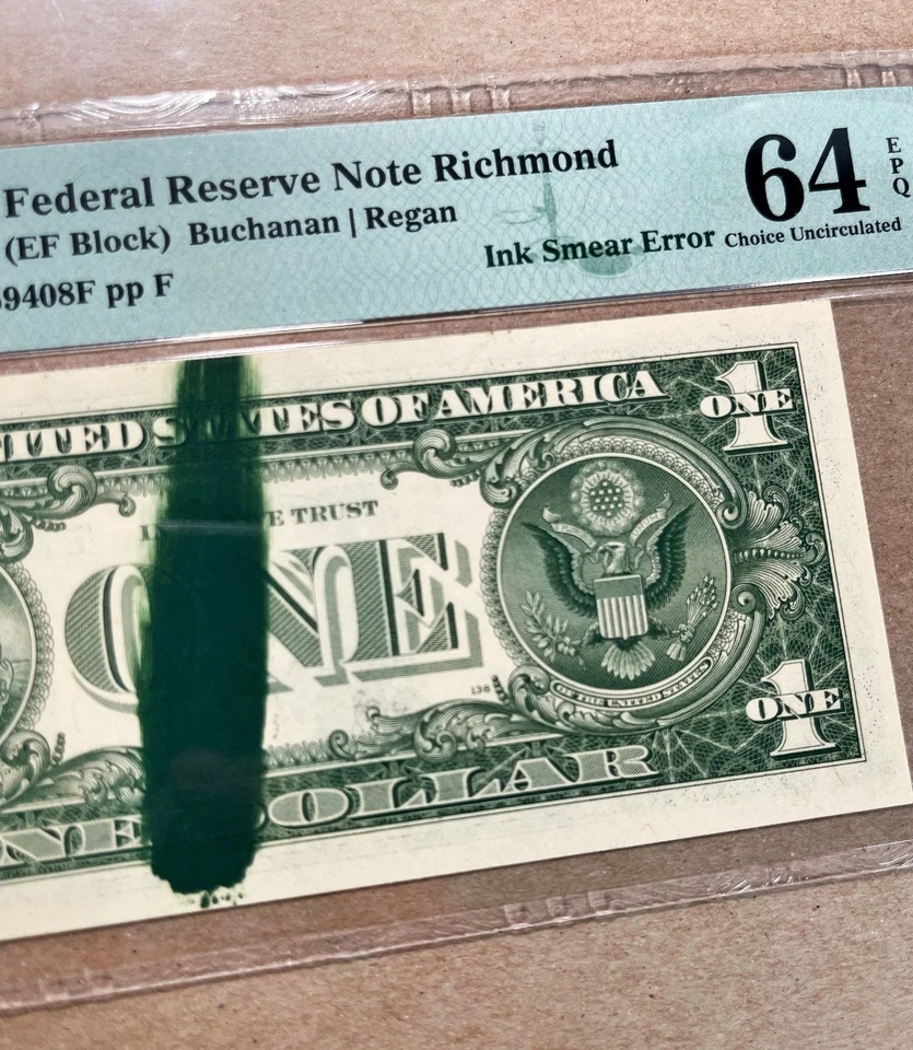 Fr. 1911-E 1981 $1 FRN RICHOND "INK SMEAR ERROR" PMG 64 EPQ - UNC - Image 1 of 3