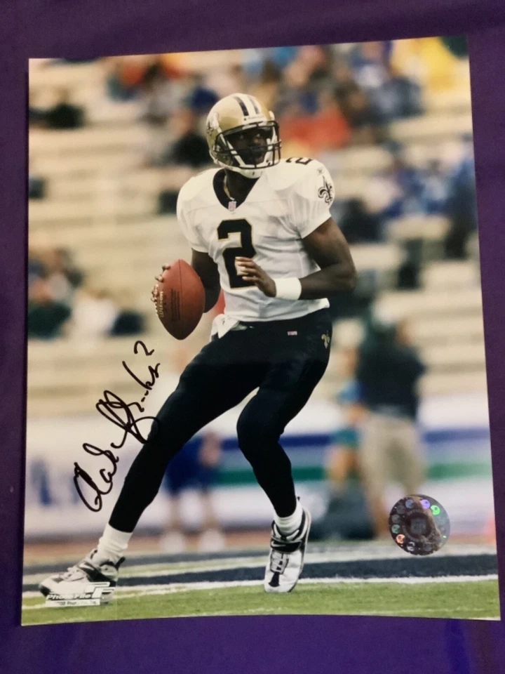 FOTO FIRMADA POR AARON BROOKS 8X10 NEW ORLEANS SAINTS UVA FÚTBOL CERTIFICADO DE AUTENTICIDAD AUTOMÁTICO Foto 1 de 1