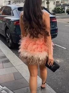 Minifalda de plumas de avestruz verdadera cintura elástica elegante Buzzy Rave falda corta - Imagen 1 de 42