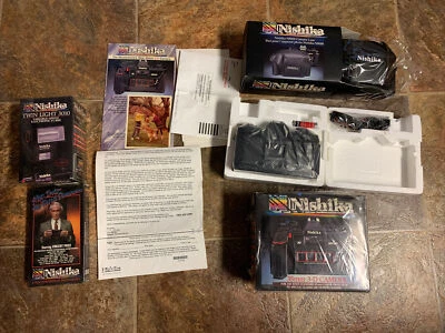 Todo COMO NUEVO Nuevo en Caja Nishika N8000 35mm Cámara 3D, Flash, Estuche y Cinta VHS Foto 1 de 4