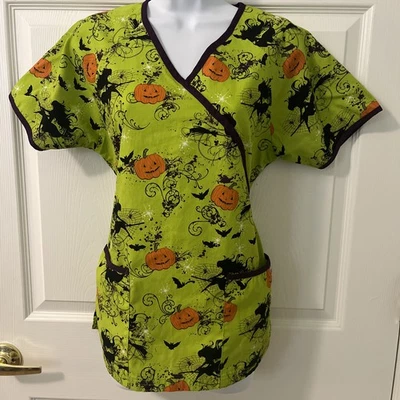 Women’s Halloween Scrub Top XS Green With Orange Pumpkins, Black Witches - Image 1 of 4