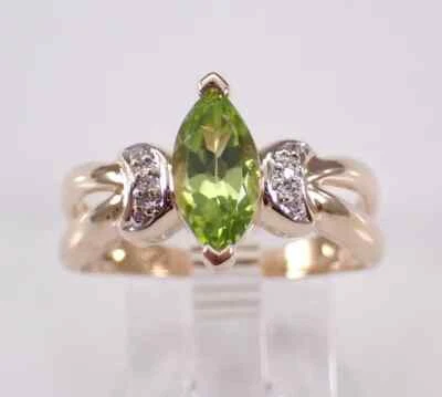 Anillo solitario de peridoto verde creado en laboratorio corte marquesa de 2 quilates enchapado en oro amarillo de 14 quilates Foto 1 de 4