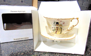 New Vintage Porcelain Tea Cup & Saucer Night Light Rotates in 2 Directions IOB