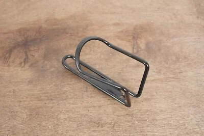 (1) Jaula para botellas de agua de aleación Planet Bike 63 g Foto 1 de 4