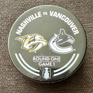 VANCOUVER CANUCKS NASHVILLE PREDATORS WARM UP PUCK 2024 HOCKEY PLAYOFFS GAME 1 - Picture 1 of 3