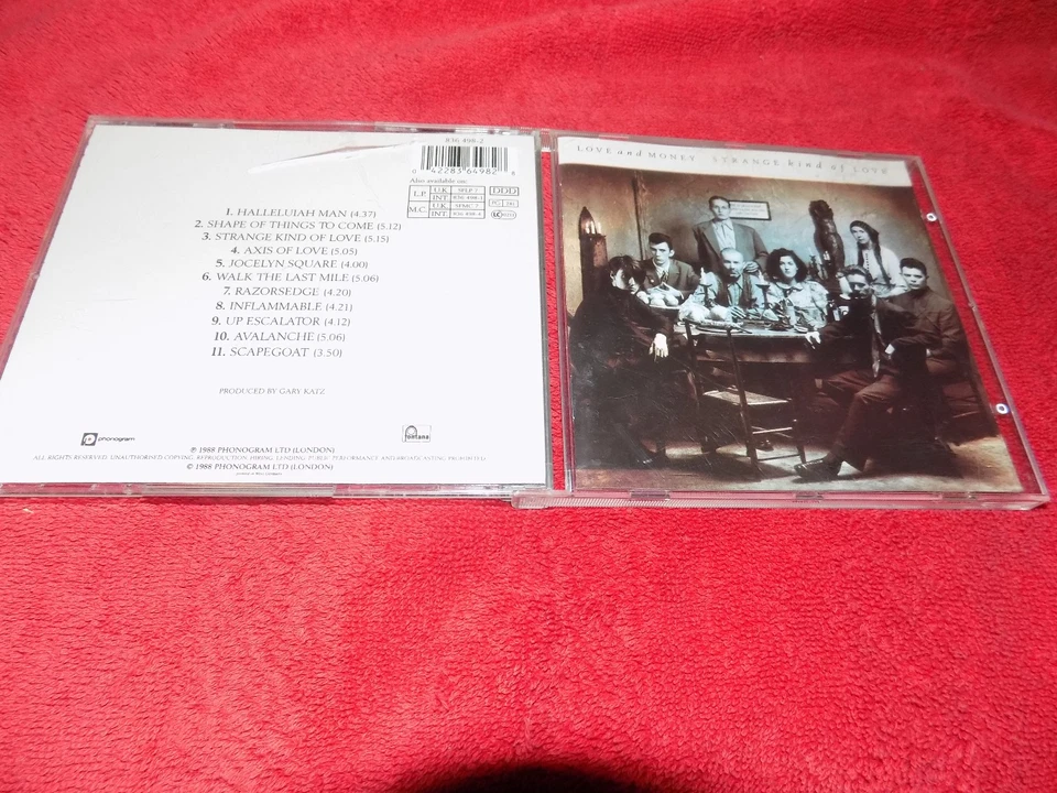 CD Love and Money - Strange Kind of Love - Bild 1 von 1