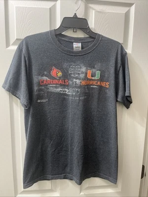 Russell Athletic Bowl Louisville Cardinals vs Miami Hurricanes 2013 talla T Foto 1 de 4