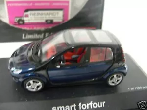 1/43 Schuco Smart forfour blu/nero 04691 - Foto 1 di 1