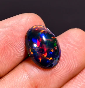 Nastri ovali opale etiope nero naturale 3,25 ct. pietra preziosa sciolta opale 14X10X5 mm - Foto 1 di 5