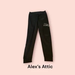 Puma Boys Black Jogger Activewear Pants Size XL pre-owned - Picture 1 of 3