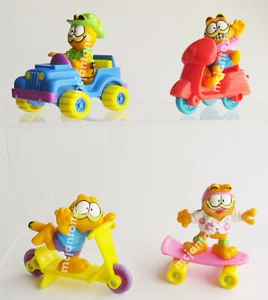 JUEGO SUELTO 4 McDonald's 1989 Garfield Cat dibujos animados PVC naranja grasa vehículo cómic - Imagen 1 de 3